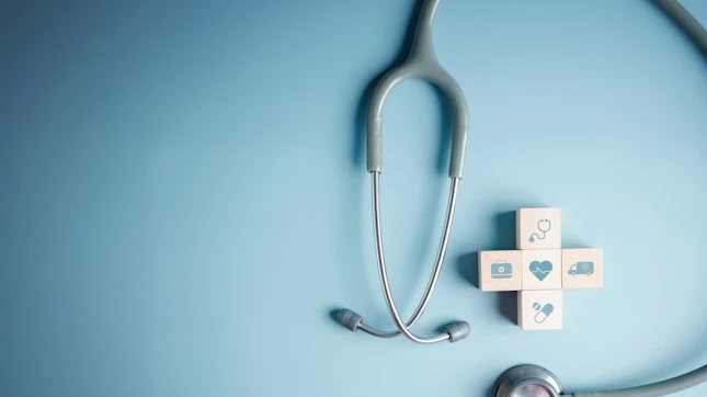 Benefícios do curso em suporte básico de vida nas empresas Stethoscope flatlay health medical device