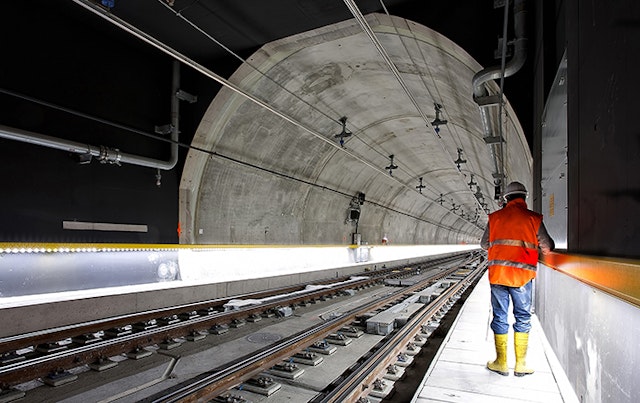 Technician Doing Maintenance Work in a Tunnel