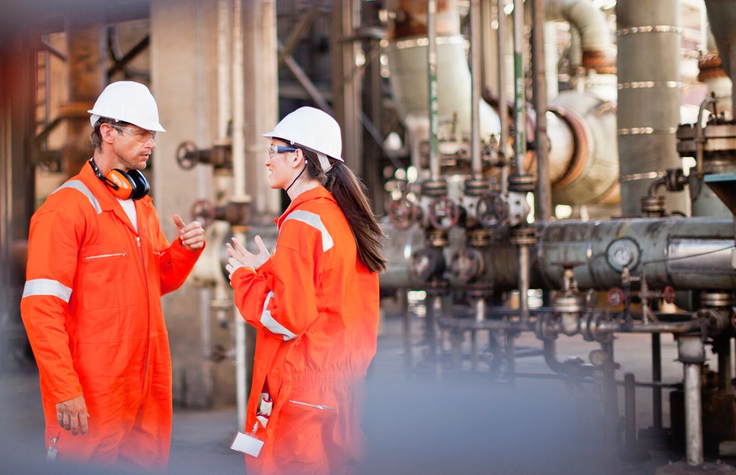 Workers in Oil Refinery