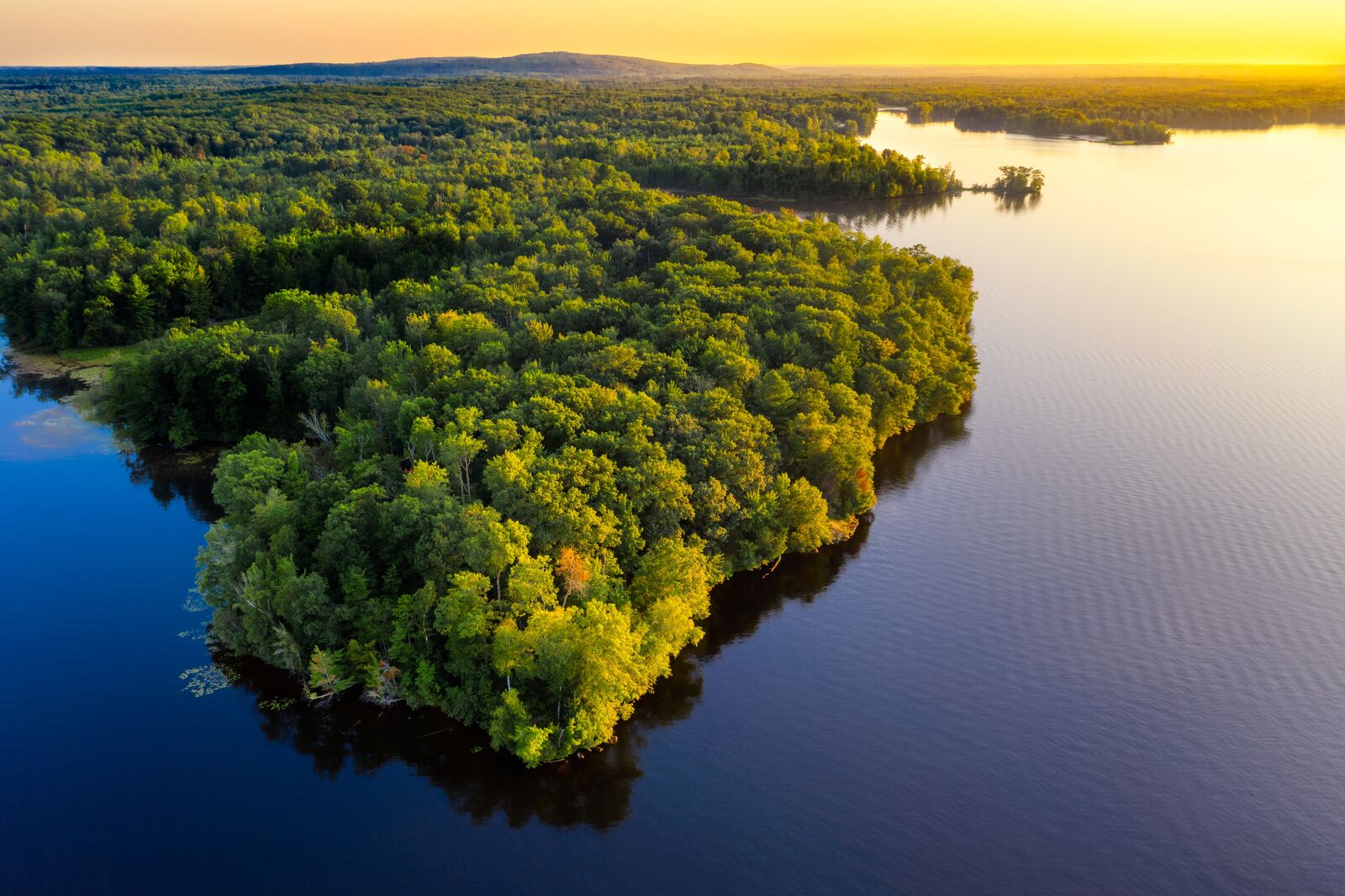 Aerial View of a Coastline at Sunset