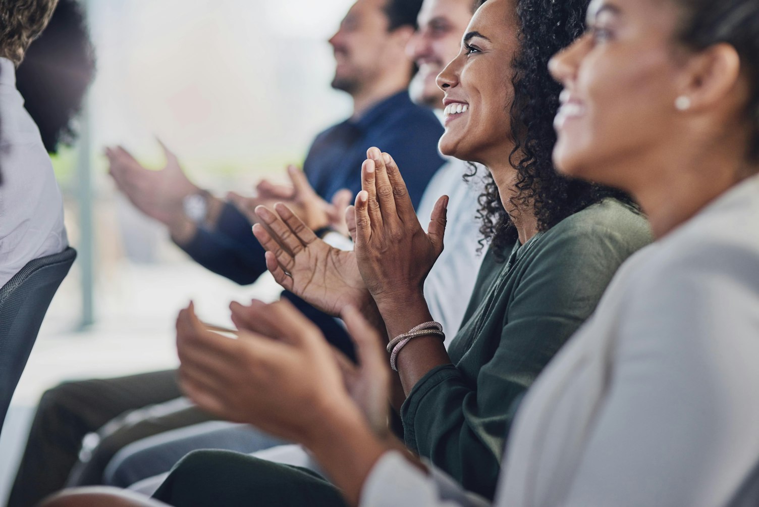 Audience Applauding at a Business Seminar