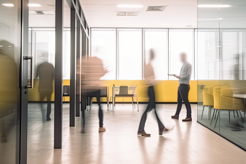 Blur Silhouette of Business men Walking in an Office