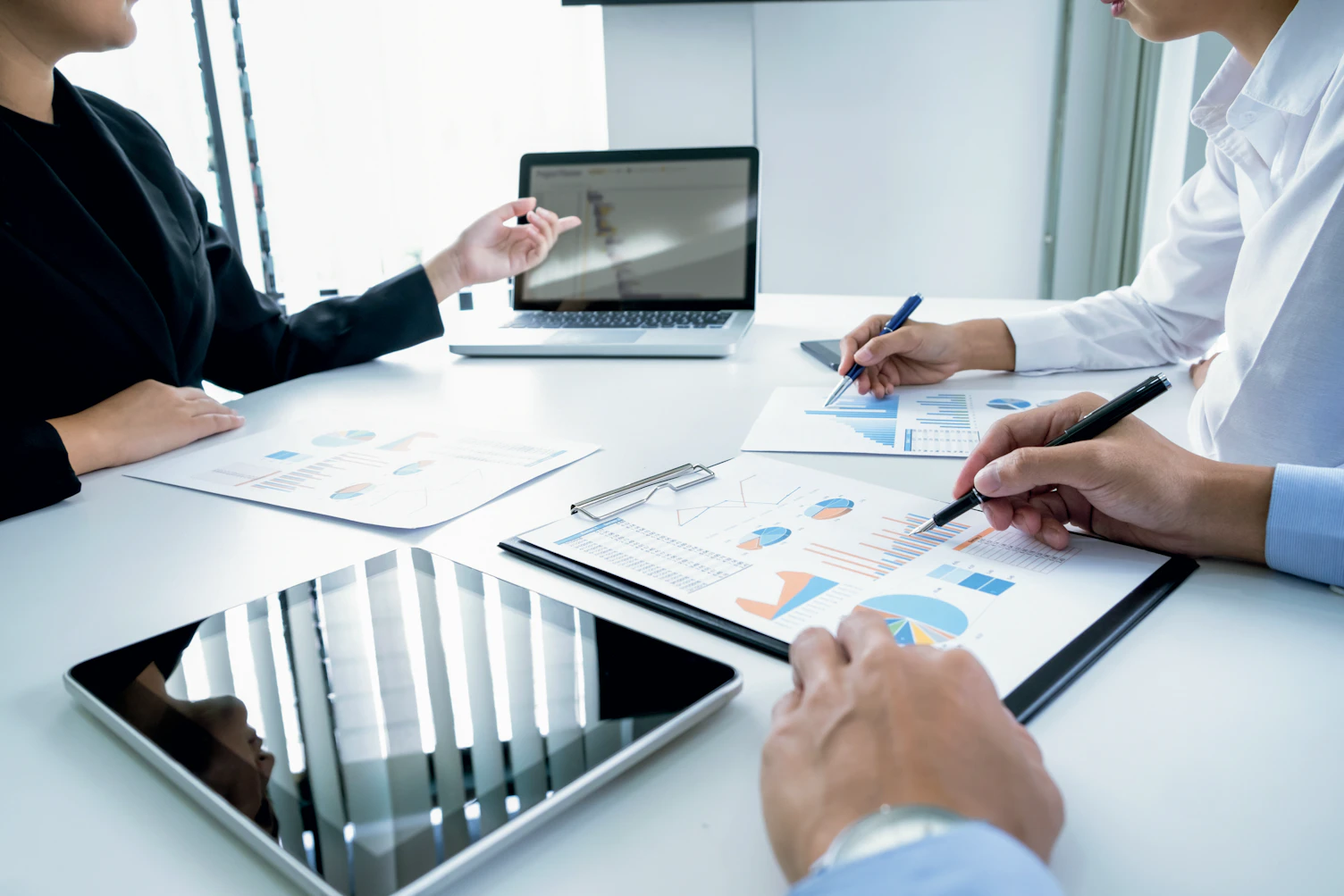 Business Colleagues Analysing Data