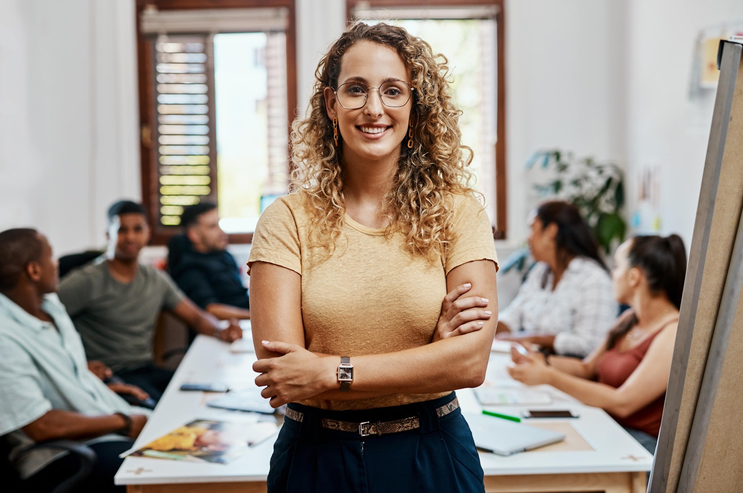 Business woman, portrait and leadership for meeting, crossed arms and collaboration with pride
