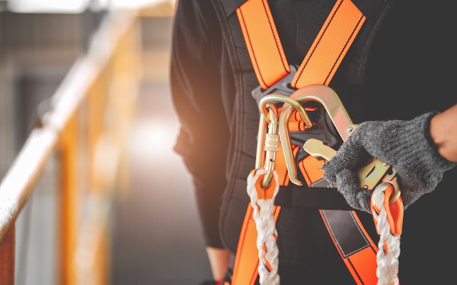 Construction Worker Wearing Safety Harness