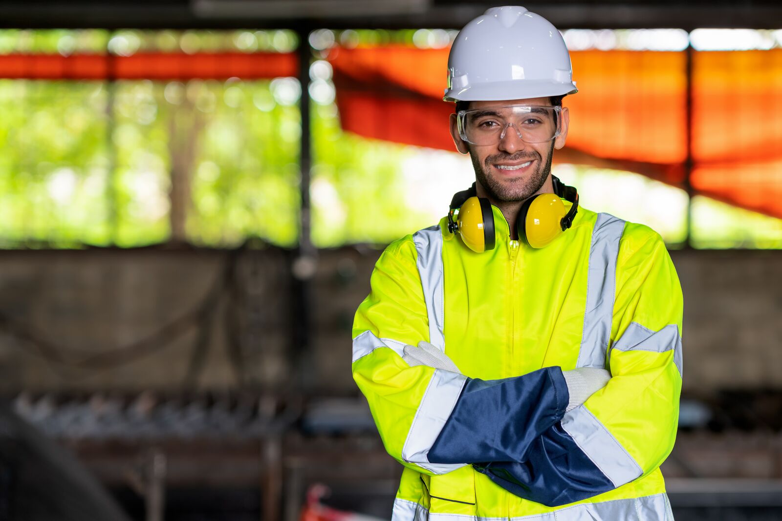 Mechanical engineer hold the arm in front of the work place.
