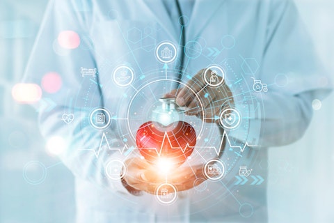 Doctor with an animated heart in his hand