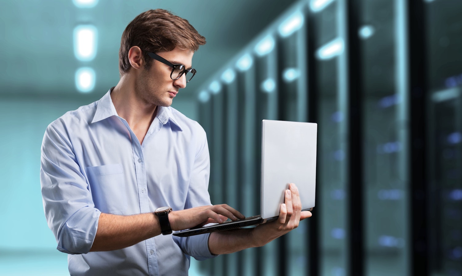 IT Engineer Working in Server Room