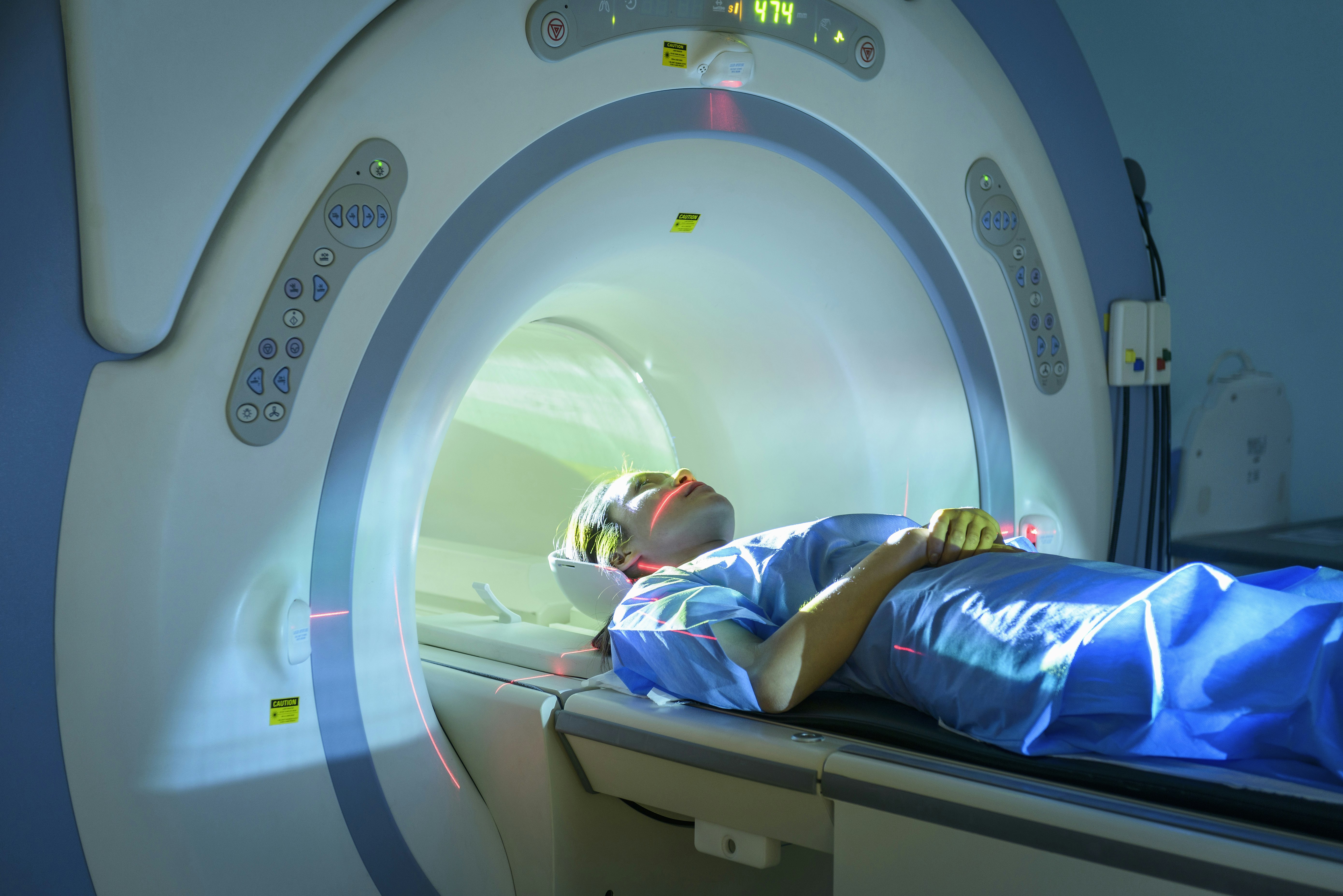 Patient entering Magnetic Resonance Imaging MRI scanner