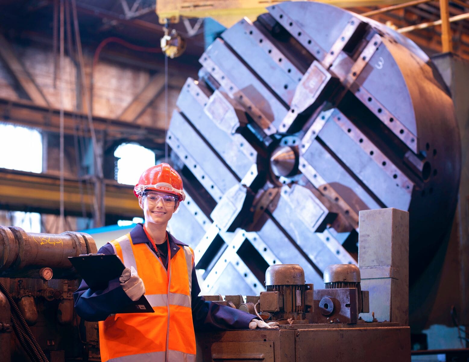 Smiling Worker in Steel Factory