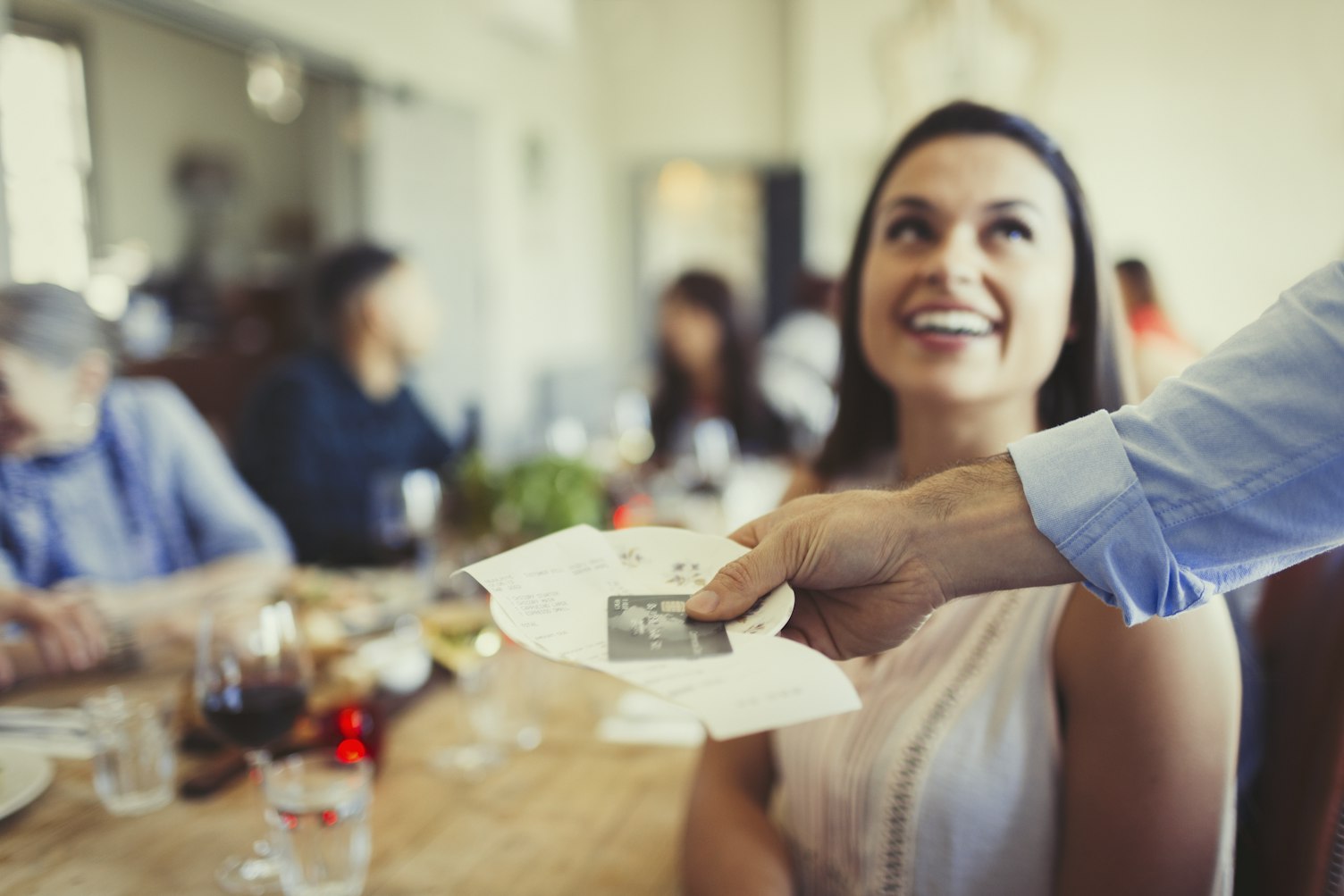 Waiter Returning Credit Card to Customer