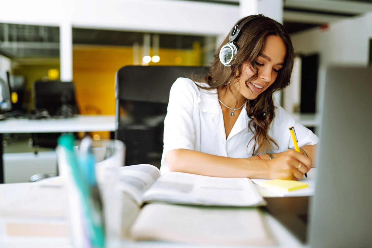 Woman Listening to a Webinar