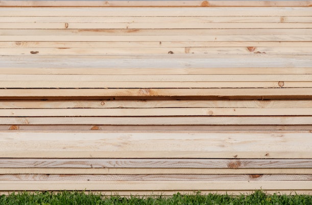 Wood planks on grass