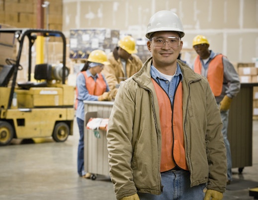 Worker wearing a safety helmet