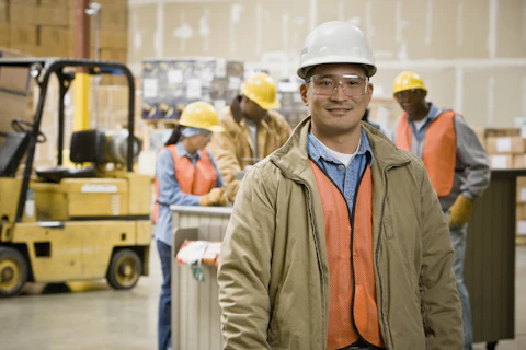 Worker wearing a safety helmet