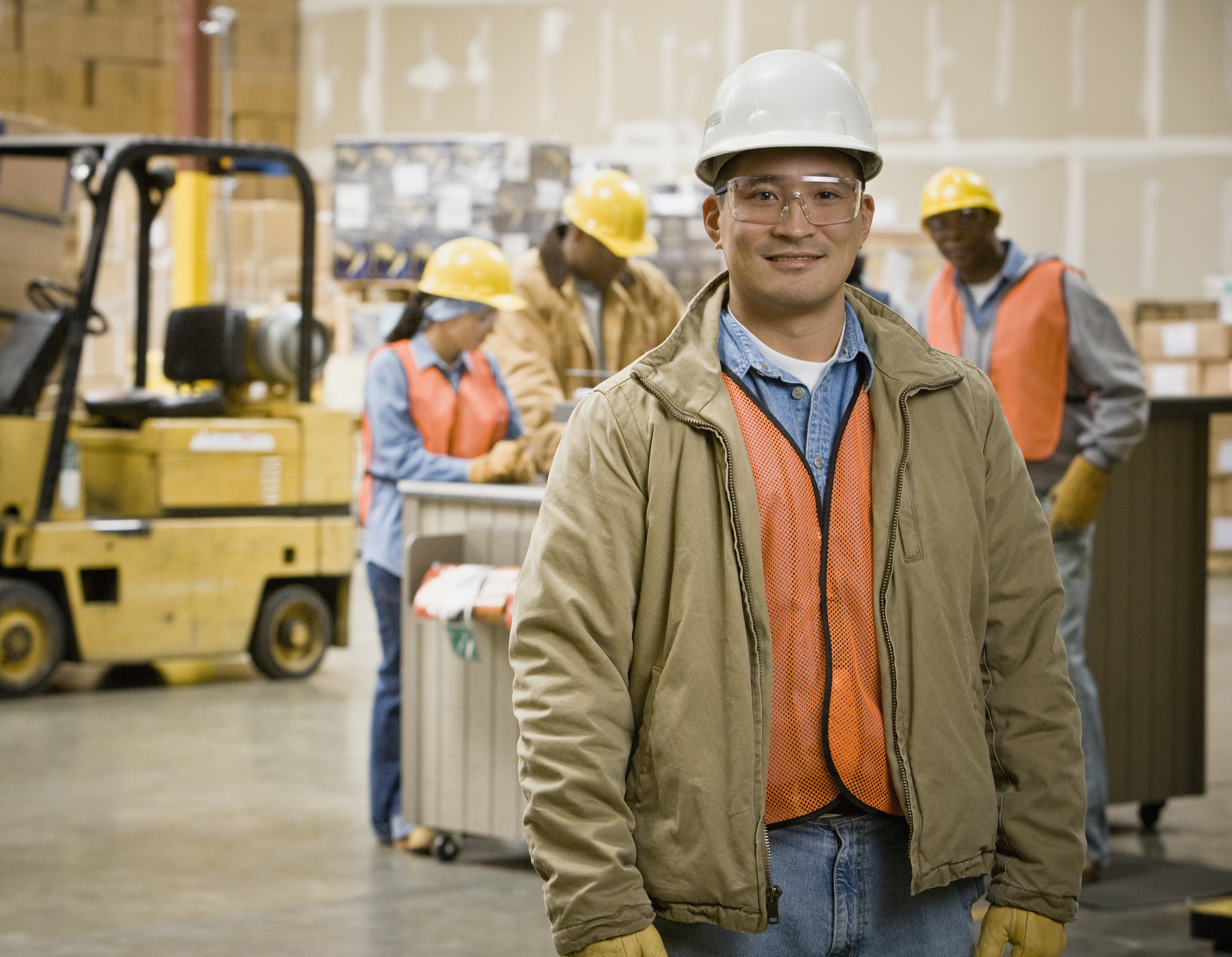Worker wearing a safety helmet