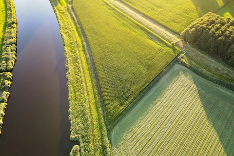 Aerial View of a River and Agriculture Fields