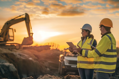 two-construction-workers-construction-site