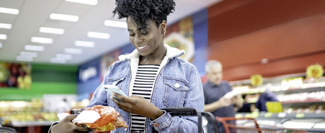 woman scanning product in a supermarket
