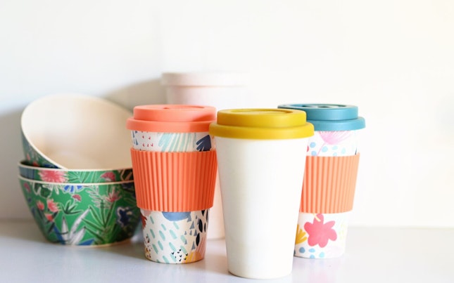 Selection of colorful bowls and coffee mugs