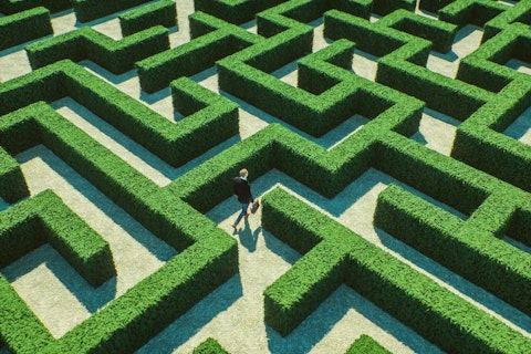 businessman walking in the maze