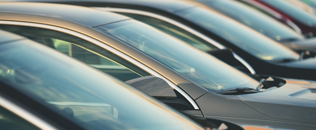 row of cars, focusing on their windscreens