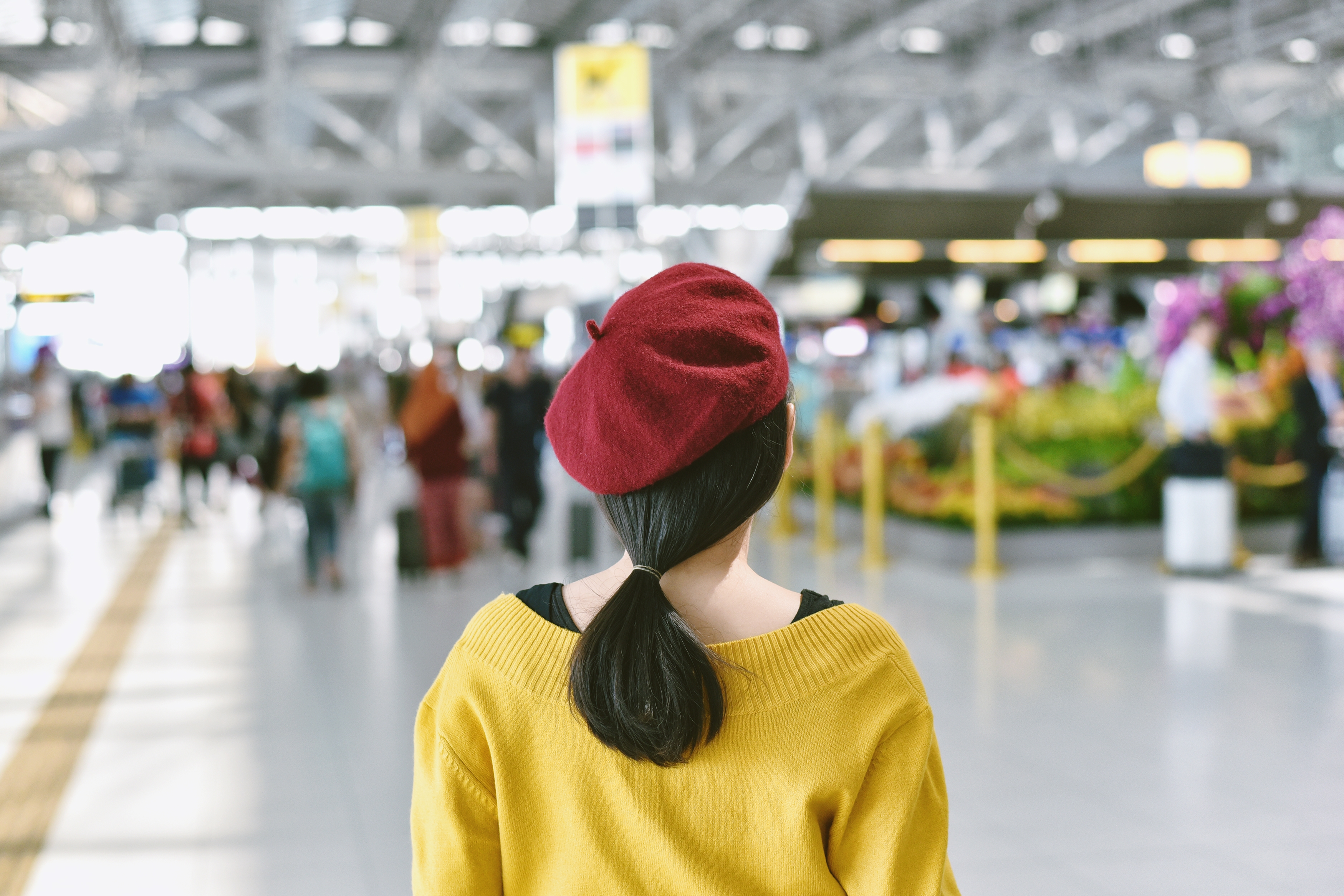 woman standing in trade fair exhibition hall