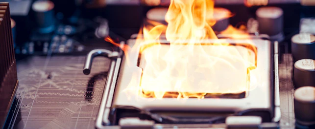 close up photo of computer chip on fire