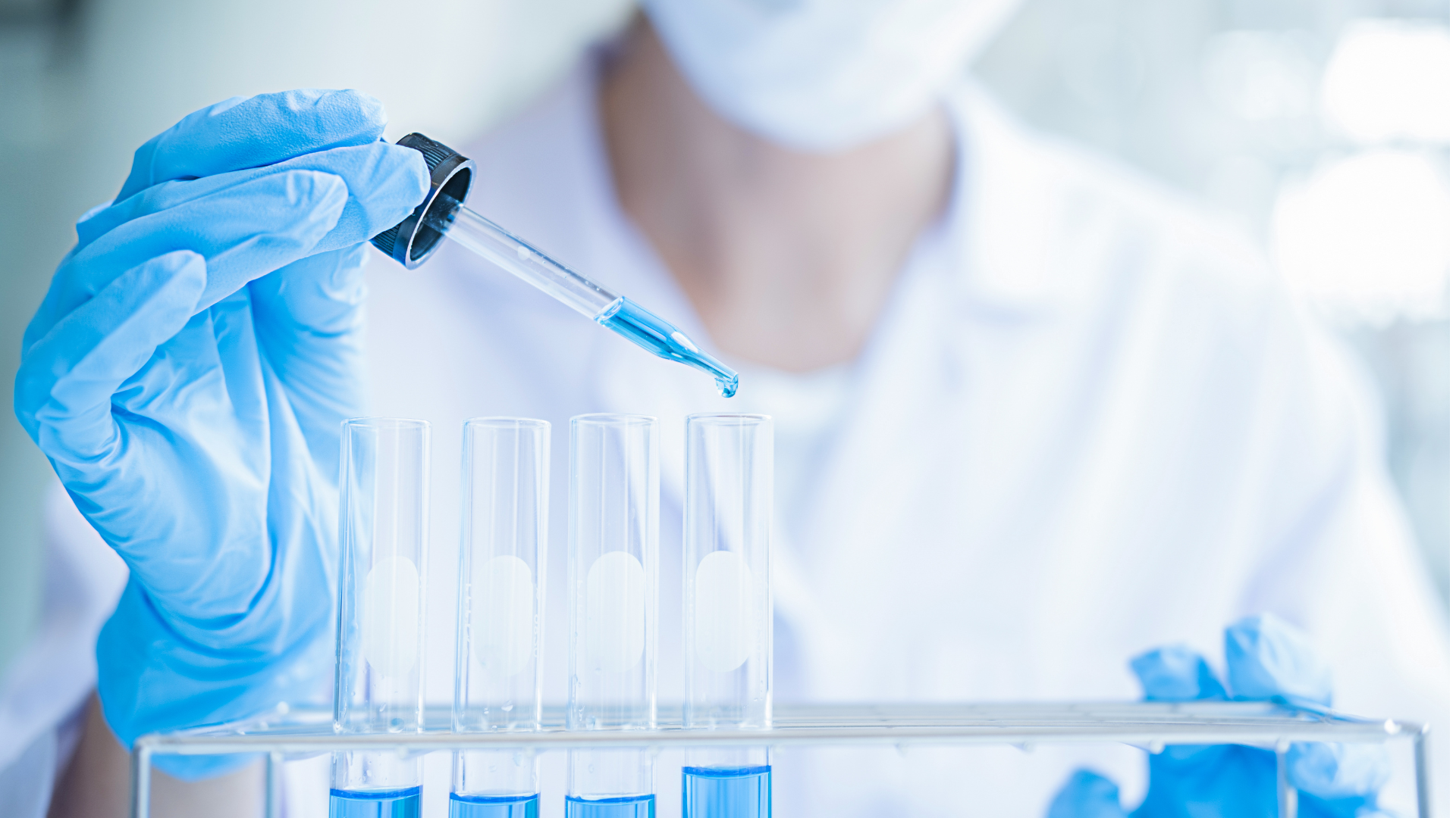 Scientist Researching with Chemical in Laboratory