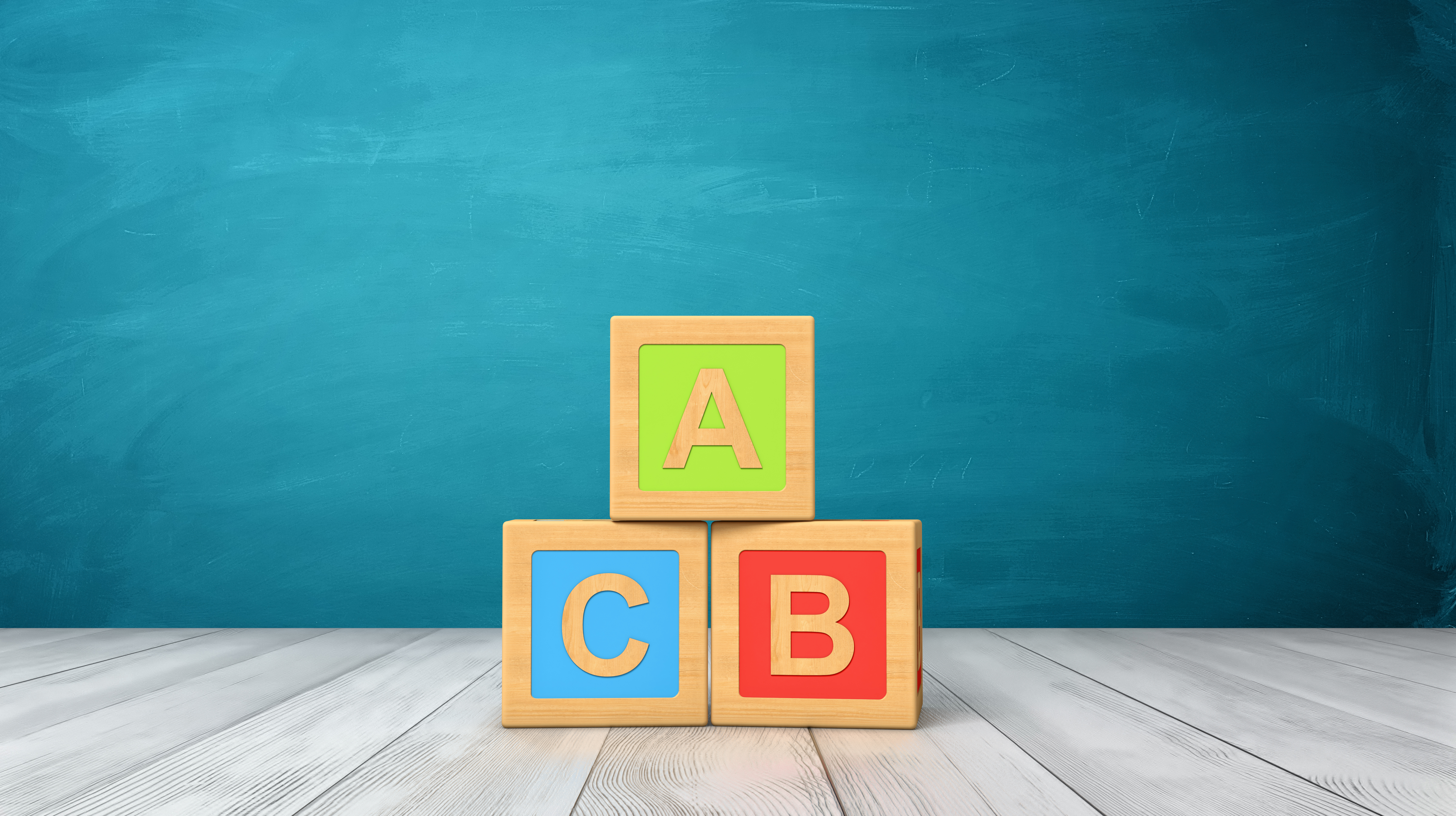 toy blocks of different colors with letters A B and C
