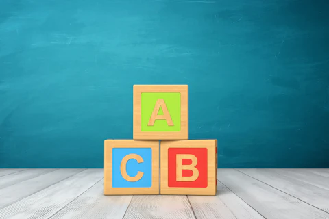 toy blocks of different colors with letters A B and C