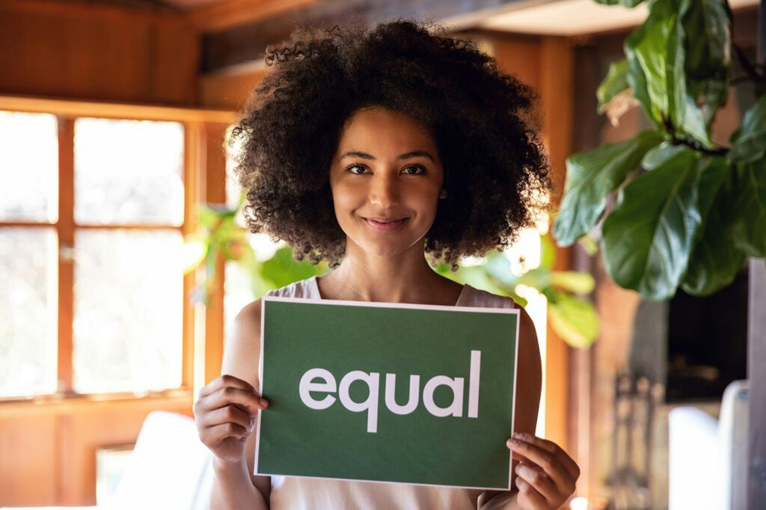 Woman Holding a Sign for Equality