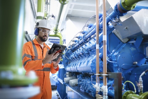 Engineer Working at Power Plant Station
