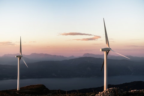 Orig wind turbines on a hill-unsplash
