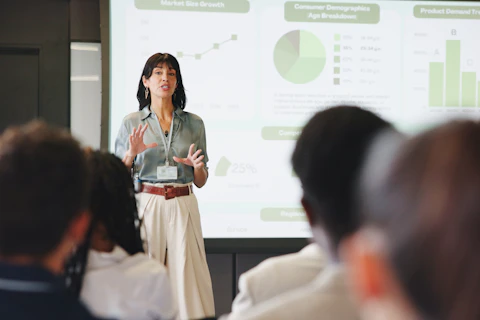 Presentation charts and businesswoman in office for planning with finance graphs or statistics Meeti