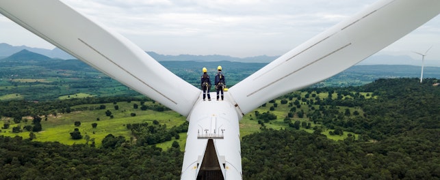 Electric Engineers Working on top of a Wind Turbine