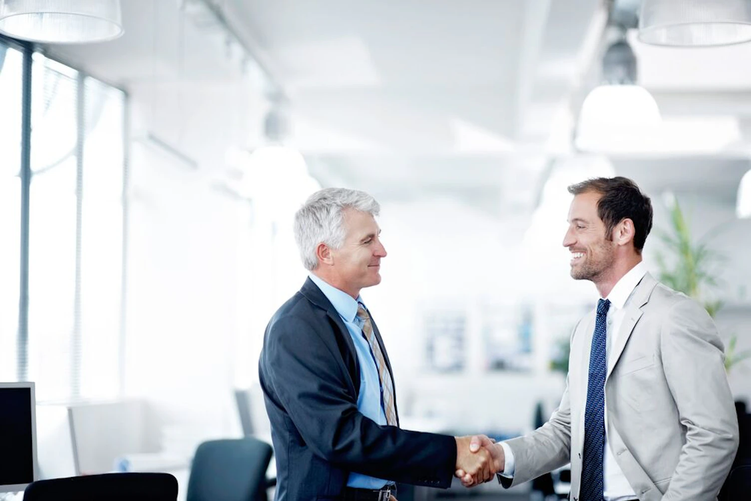 colleagues shaking hands