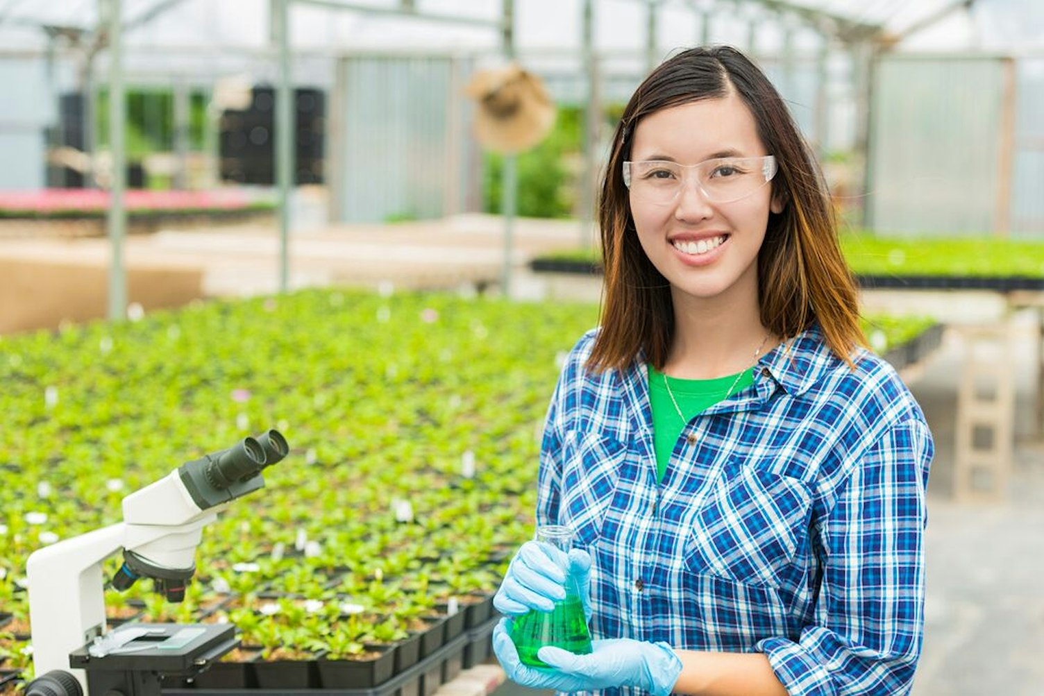 Worker in Greenhouse Laboratory