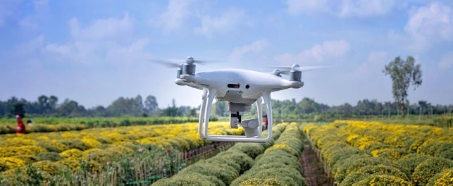 Drone Inspecting Agricultural Field