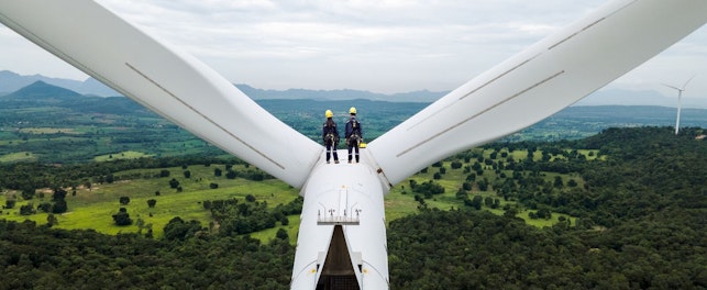 Electric Engineers Working on top of a Wind Turbine