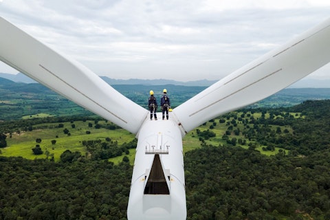 Electric Engineers Working on top of a Wind Turbine