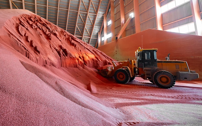 Excavator Collects Red Potassium Agricultural Fertilizers