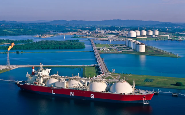 Natural Gas Tanker at Port with LNG Liquefaction Plant