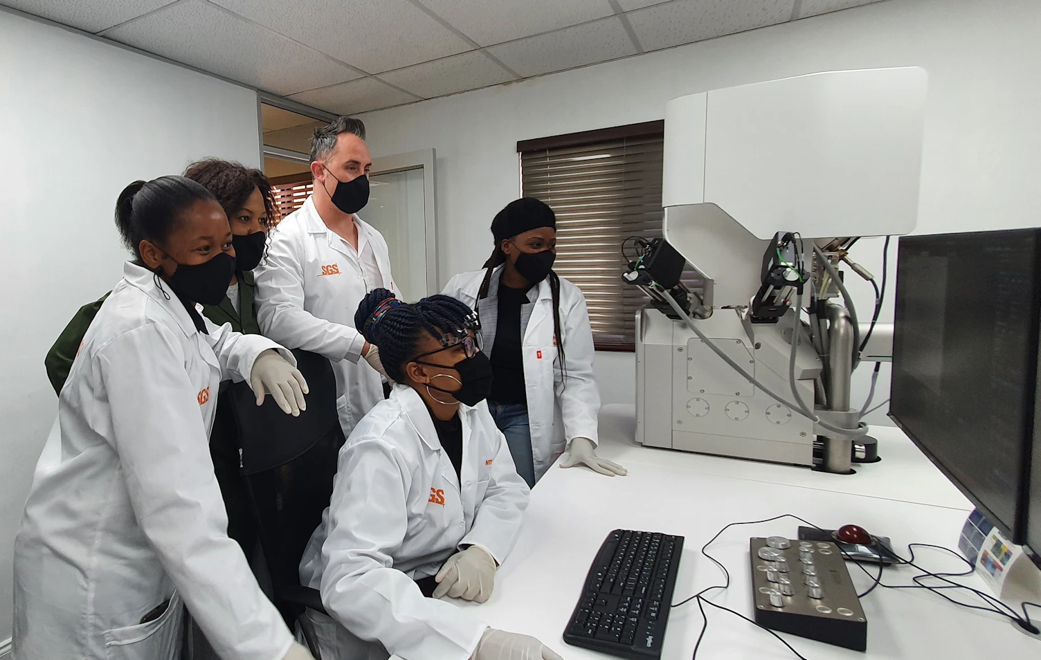 SGS Scientists Testing Something