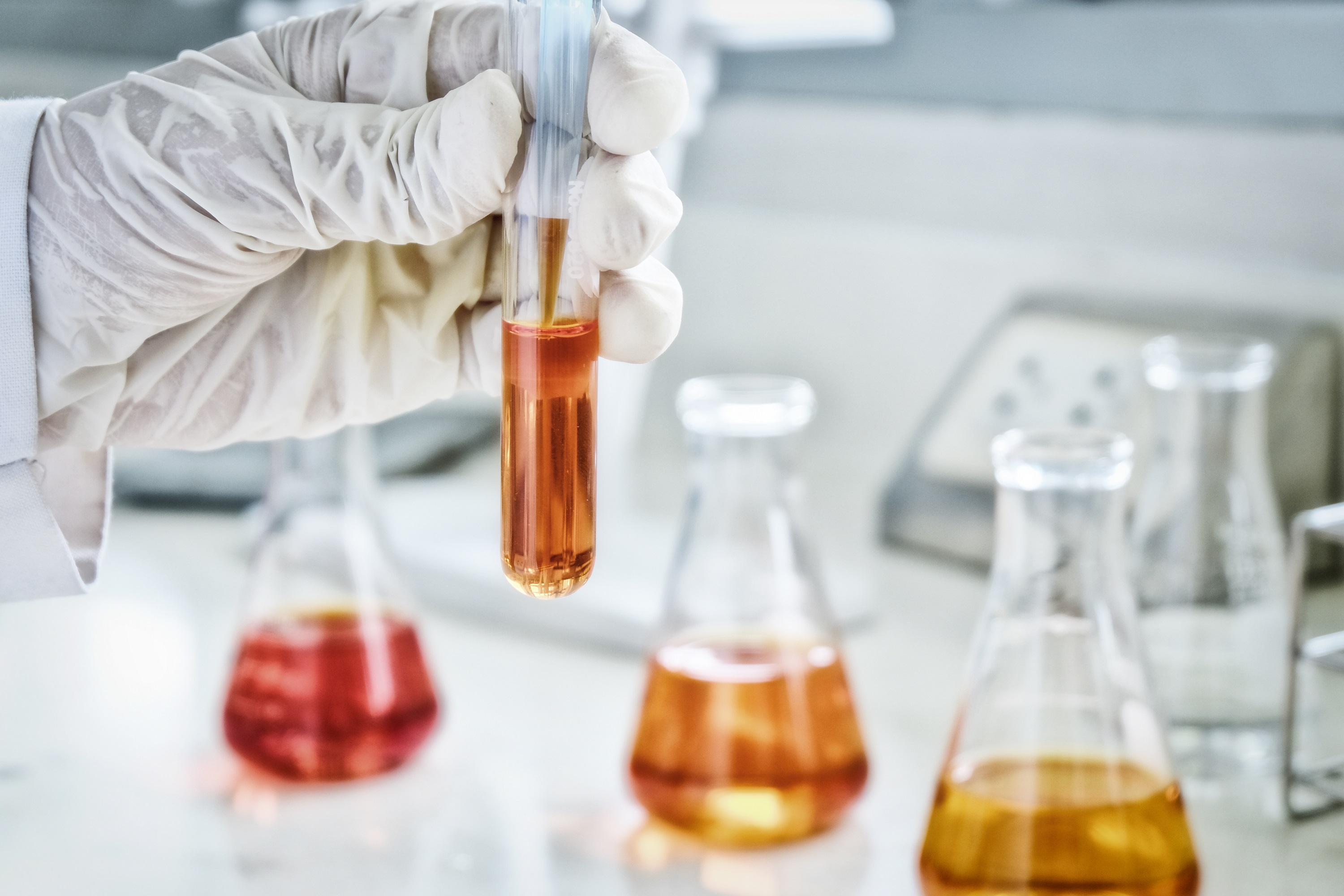 The Scientist Test the Natural Product Extract Oil and Biofuel Solution In the Chemistry Laboratory