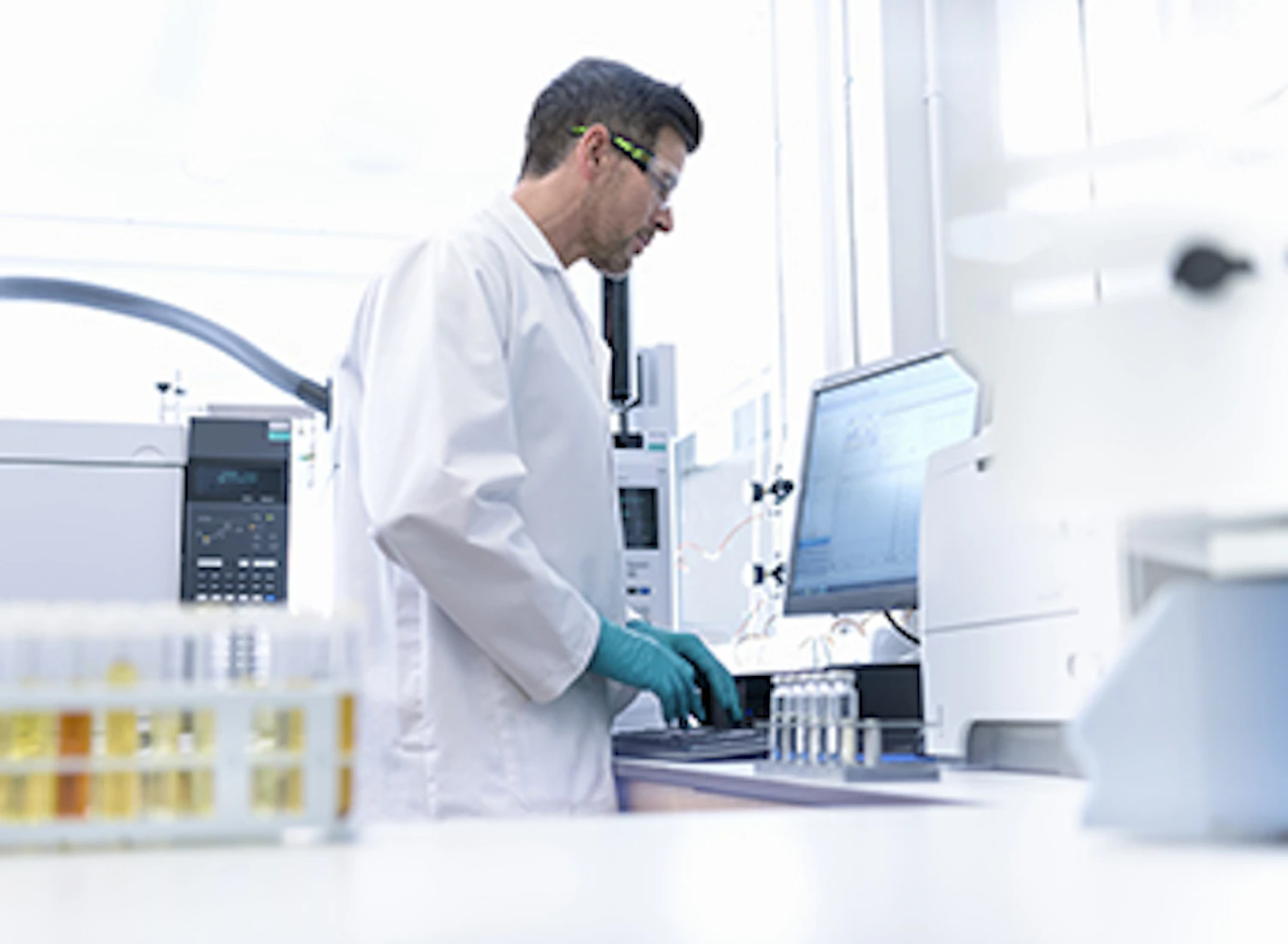 344x252 orig scientist working from his station in oil testing laboratory Getty626537041