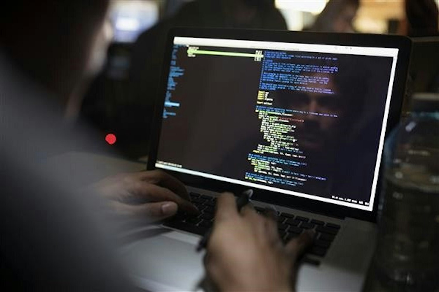 Hacker Trying to Break into the Cyberspace 600x400