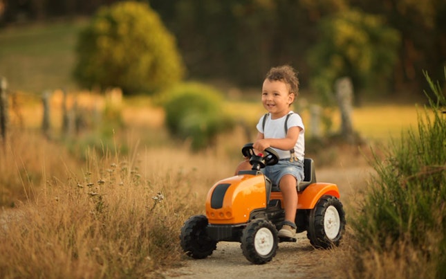 kid on tractor
