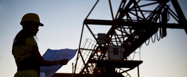 main feature architect looking at plan