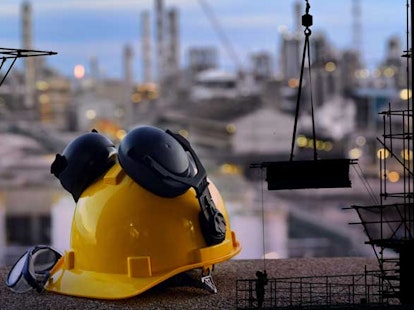 main feature construction helmet on construction platform